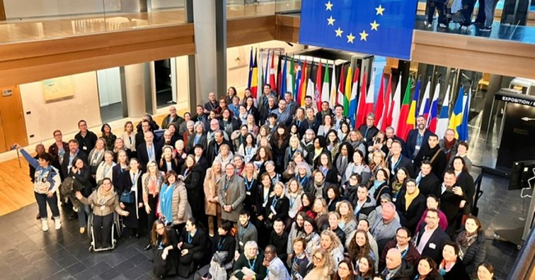 Group photo of all participants, inside the European Parliament